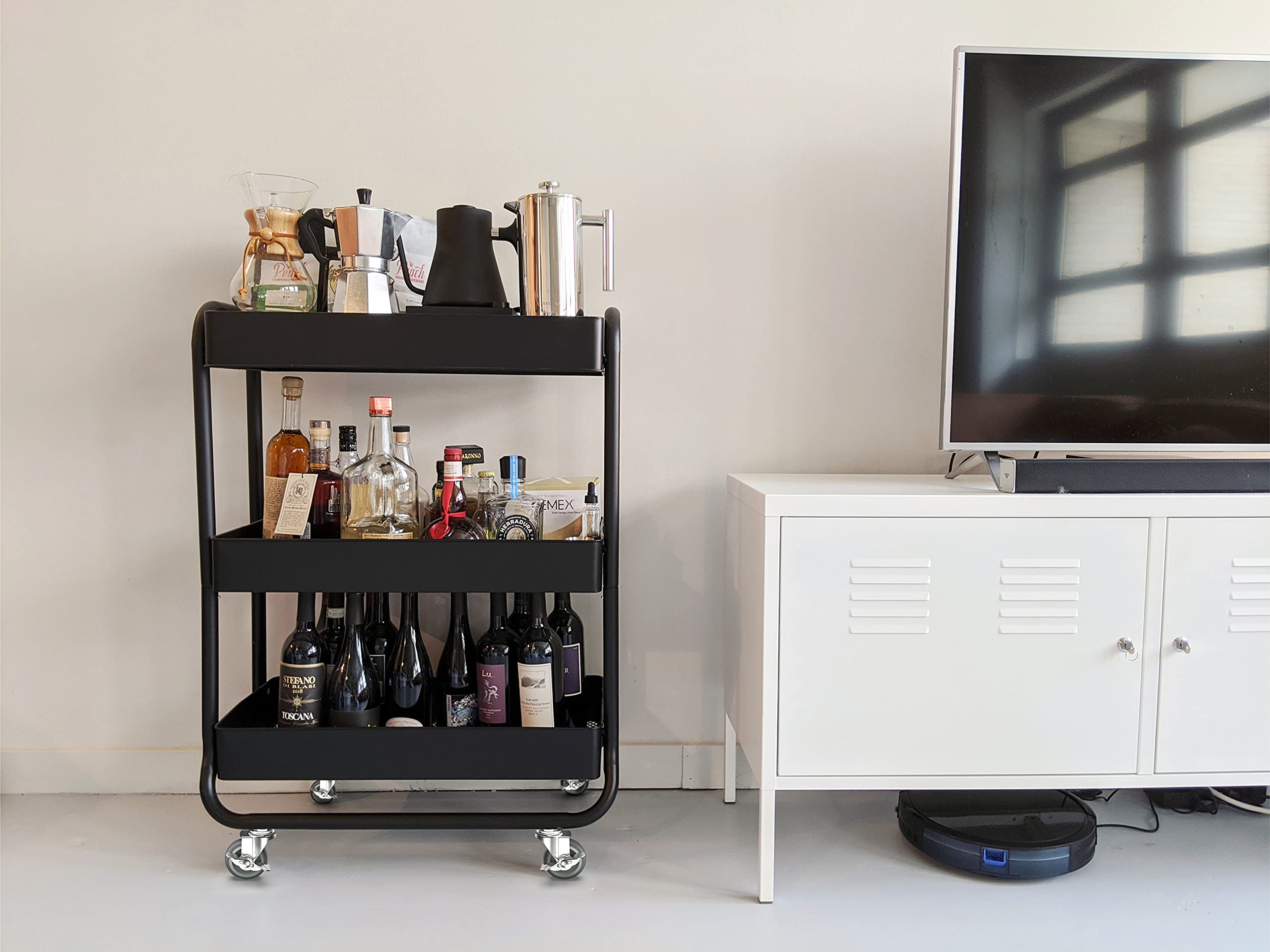 Black rolling bar cart with liquor bottles on Holkie stem caster grey, ideal for home bar or entertainment space