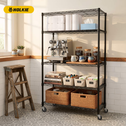 A black 4-tier wire kitchen rack with HOLKIE wheels holding coffee maker, snacks, and kitchen supplies