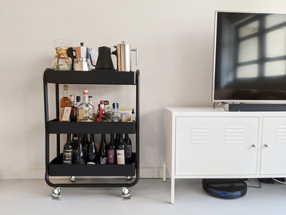 Black rolling bar cart with liquor bottles on Holkie stem caster grey, ideal for home bar or entertainment space